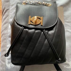 bebe Quilted Black Backpack with Gold Accent